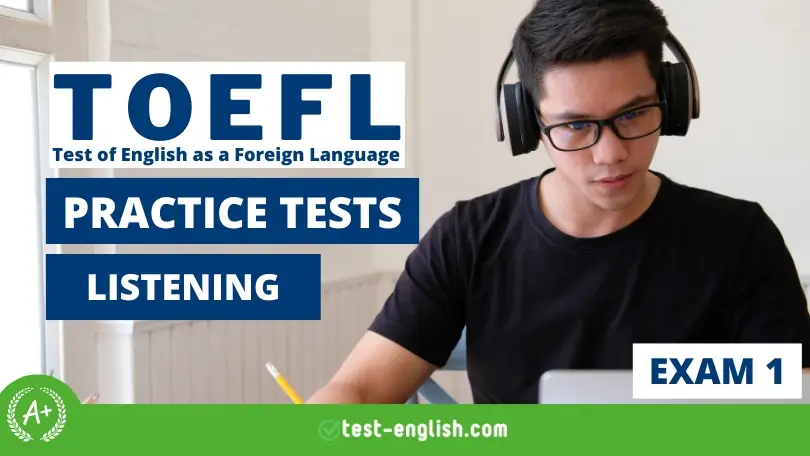 Focused young man wearing headphones while studying for the TOEFL iBT Listening exam on his laptop
